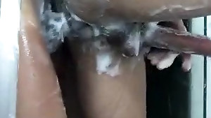 Twink gets a soapy massage and a nice anal fuck