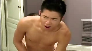 Horny twink pounding his Asian boy toy hard and fast
