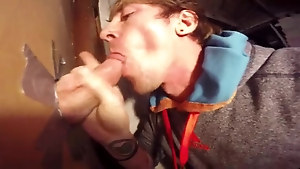 Twink takes cum in his mouth in glory hole room