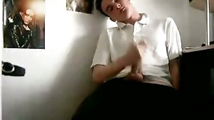 Nerdy British twink grabs his fat cock and jerks off