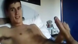Twink dude loves jerking his huge dick for the camera